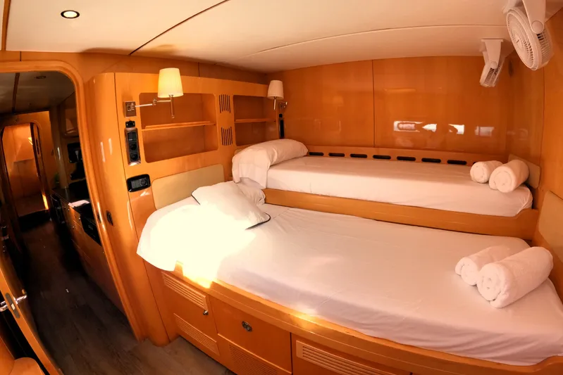 Audaz Yacht Photos Pics Luxurious cabin interior of 2007 Privilege 615 yacht with cozy twin beds.