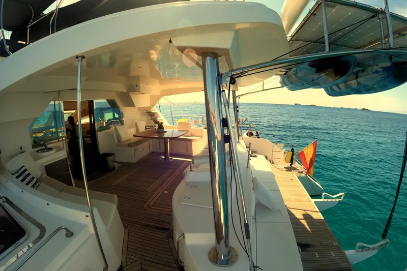 Audaz Yacht Photos Pics Luxurious 2007 Privilege 615 yacht deck with ocean view and seating area.