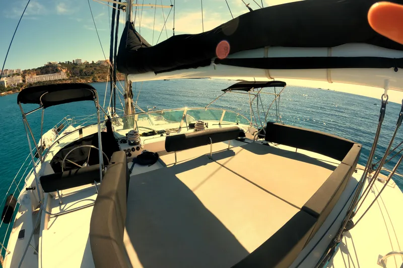 Audaz Yacht Photos Pics Luxurious 2007 Privilege 615 yacht deck with ocean view and seating area.