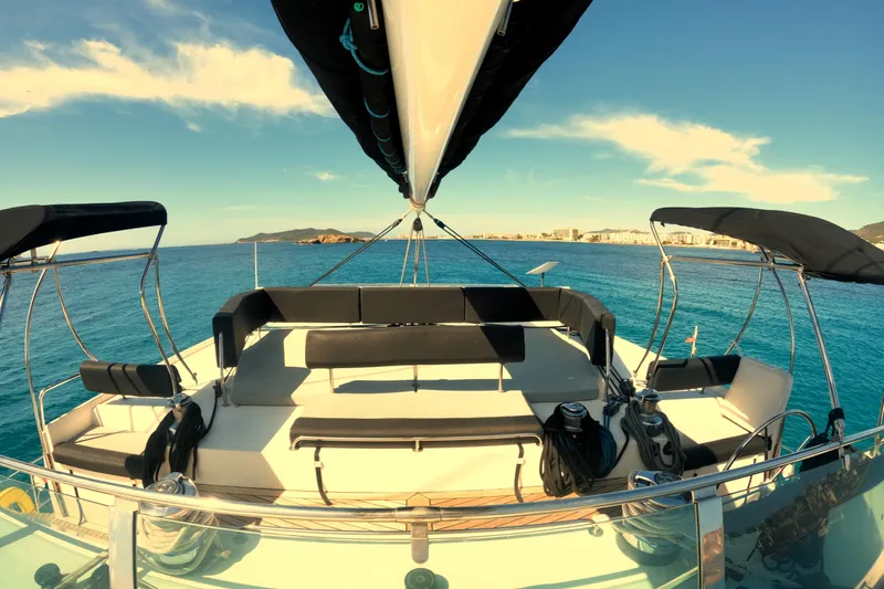 Audaz Yacht Photos Pics Luxurious 2007 Privilege 615 yacht deck with ocean view and seating area.