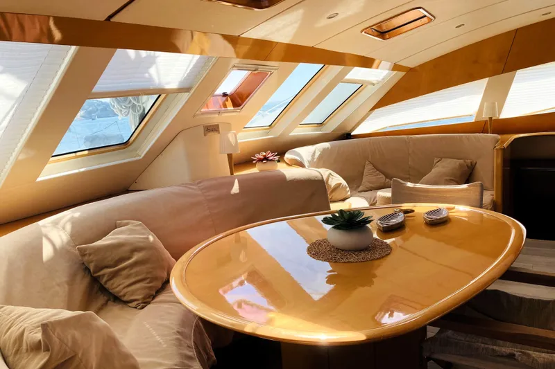 Audaz Yacht Photos Pics Luxurious interior of 2007 Privilege 615 yacht with plush seating and elegant decor.