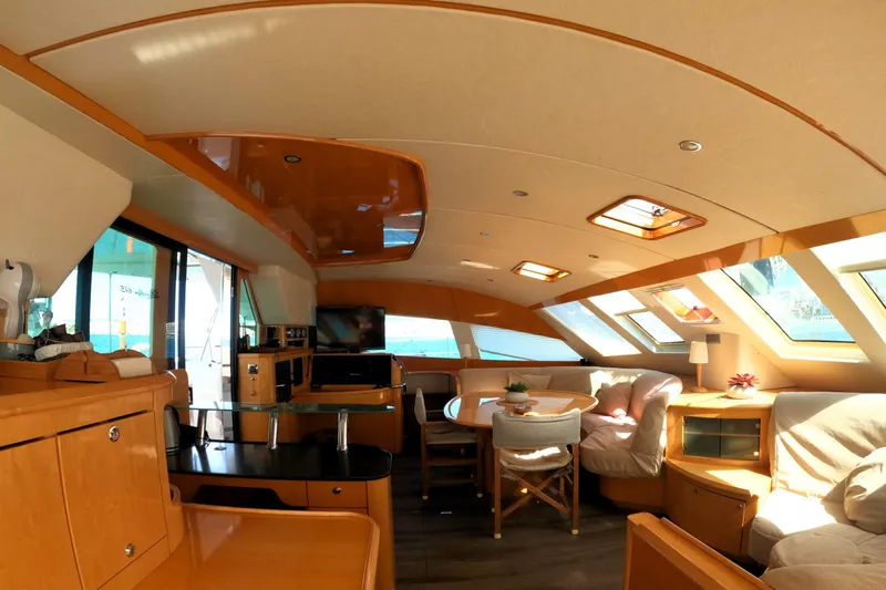 Audaz Yacht Photos Pics Luxurious interior of 2007 Privilege 615 yacht with modern furnishings and ample natural light.