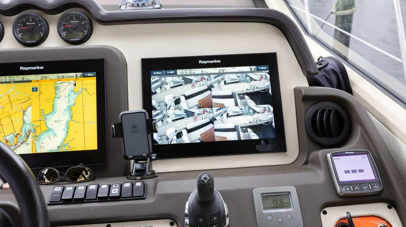 Knot On Call Yacht Photos Pics Cockpit of 2015 Azimut 55S yacht with navigation screens and controls.