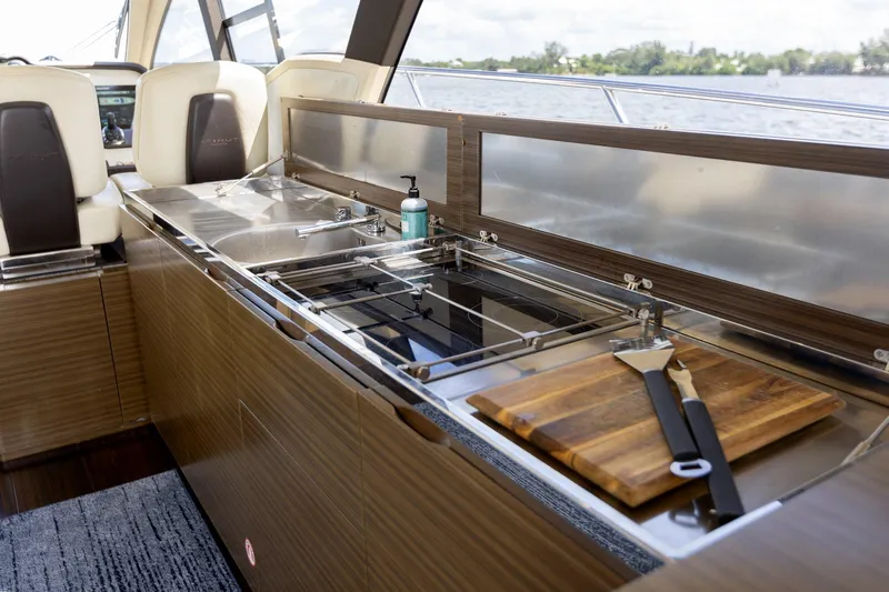 Knot On Call Yacht Photos Pics Luxurious 2015 Azimut 55S yacht interior with modern kitchen amenities.