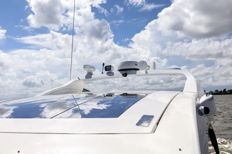 Knot On Call Yacht Photos Pics Azimut 55S 2015 yacht on water under cloudy sky.