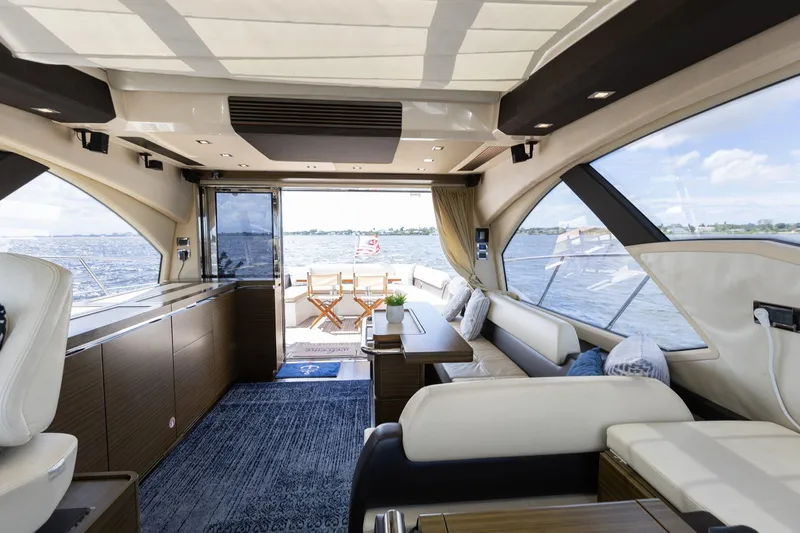 Knot On Call Yacht Photos Pics Luxurious interior of 2015 Azimut 55S yacht with scenic ocean view.