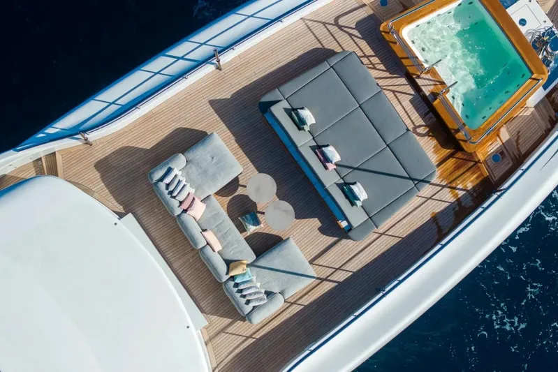 Watercolours Yacht Photos Pics Luxurious 2022 Benetti DIAMOND yacht deck with seating and jacuzzi, aerial view.