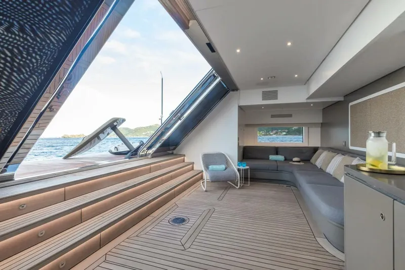 Watercolours Yacht Photos Pics Luxurious interior of 2022 Benetti DIAMOND yacht with modern seating and ocean view.