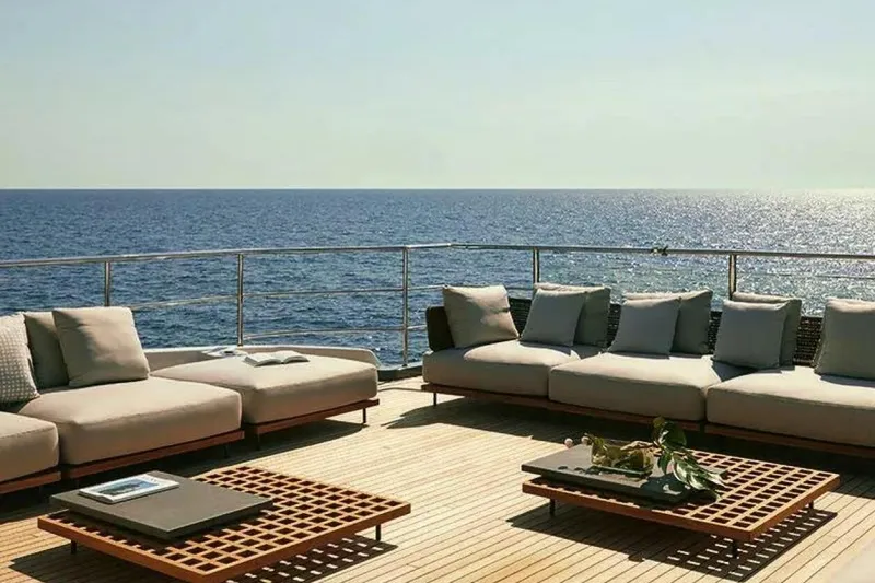 Watercolours Yacht Photos Pics Luxurious Benetti DIAMOND 2022 yacht deck with elegant seating overlooking the ocean.