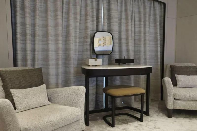 Watercolours Yacht Photos Pics Luxurious Benetti DIAMOND 2022 yacht interior with elegant seating and vanity area.