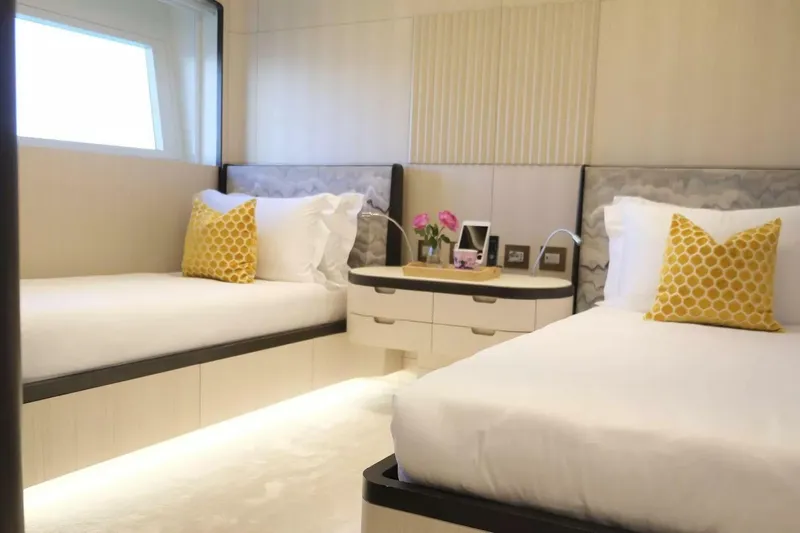 Watercolours Yacht Photos Pics Luxurious 2022 Benetti DIAMOND yacht bedroom with twin beds and elegant decor.