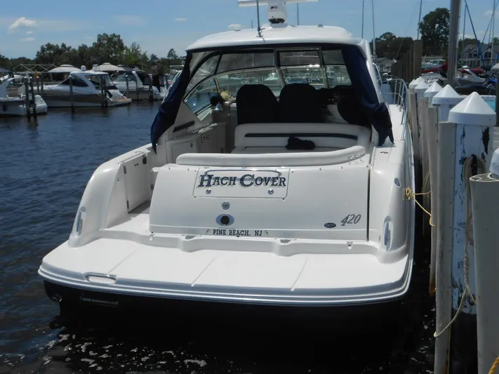  Yacht Photos Pics 2004 Sea Ray 420 Sundancer docked at marina.