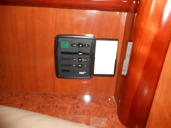  Yacht Photos Pics Control panel inside 2004 Sea Ray 420 Sundancer yacht with wooden interior.