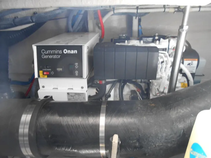  Yacht Photos Pics Cummins Onan generator in the engine room of a 2004 Sea Ray 420 Sundancer.