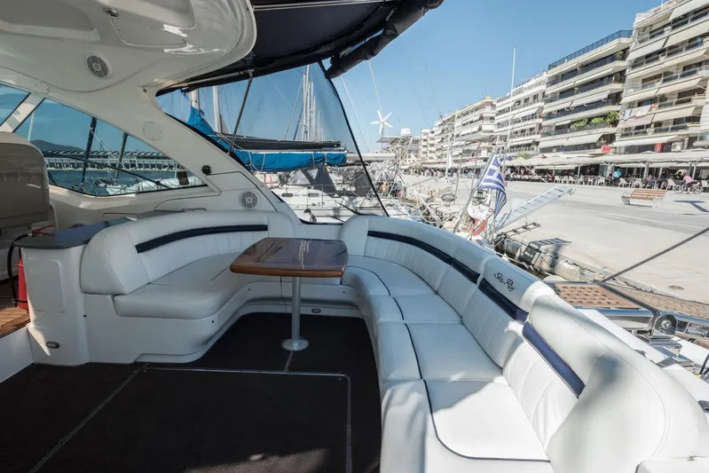  Yacht Photos Pics Luxurious 2007 Sea Ray 515 Sundancer yacht with spacious seating and elegant design at marina.