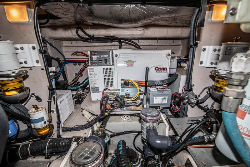  Yacht Photos Pics Engine room of 2007 Sea Ray 515 Sundancer with various mechanical components and wiring.