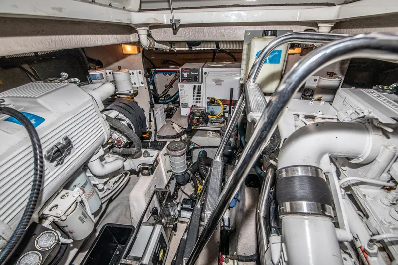  Yacht Photos Pics Engine room of 2007 Sea Ray 515 Sundancer yacht, showcasing mechanical components and systems.