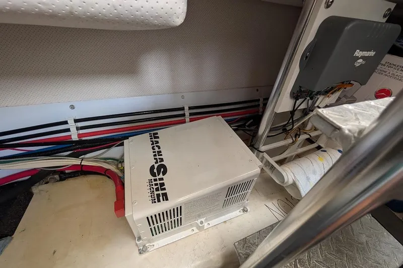 Lulu Jack Yacht Photos Pics Electrical components and wiring inside a 2008 Mainship 38 boat, featuring a Magnum inverter.
