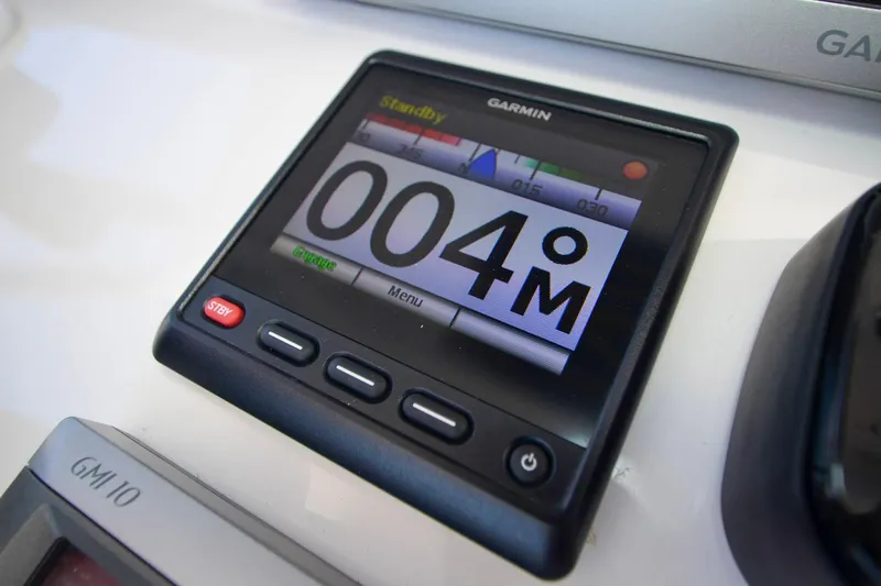 Quid Pro Quo Yacht Photos Pics Garmin marine display on 2013 Intrepid 300 Center Console boat dashboard.