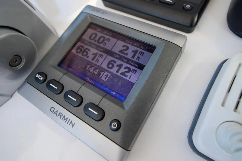 Quid Pro Quo Yacht Photos Pics Garmin GPS display on 2013 Intrepid 300 Center Console boat dashboard.