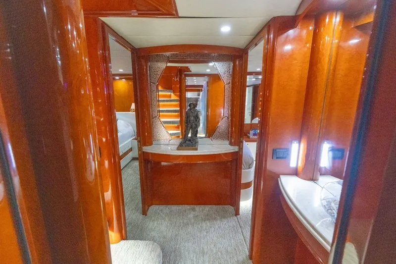 Kaya Yacht Photos Pics Luxurious interior of a 2003 Johnson 87' Motor Yacht with elegant wood finishes.