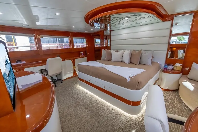 Kaya Yacht Photos Pics Luxurious interior of 2003 Johnson 87' Motor Yacht with elegant bedroom design.