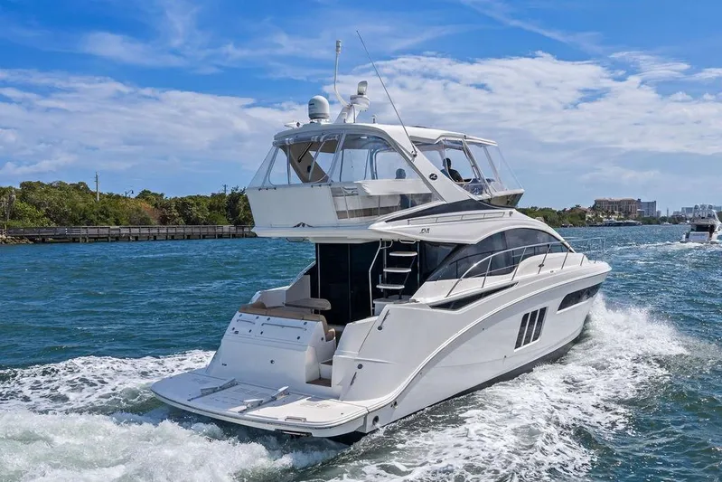 Ern'd It Yacht Photos Pics 2017 Sea Ray Fly 510 yacht cruising on a sunny day.