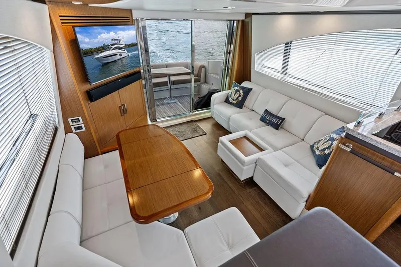 Ern'd It Yacht Photos Pics Luxurious interior of 2017 Sea Ray Fly 510 yacht with elegant seating and modern decor.