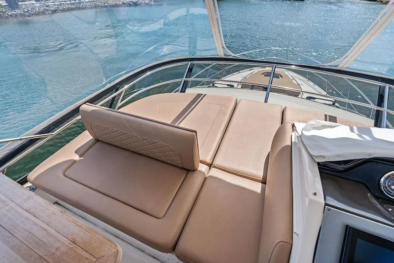Ern'd It Yacht Photos Pics Luxurious 2017 Sea Ray Fly 510 yacht with spacious sunbathing deck on calm waters.
