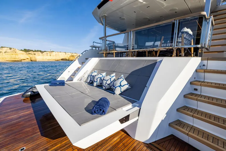  Yacht Photos Pics Luxurious Sunseeker 100 Yacht 2025 with elegant deck seating and ocean view.