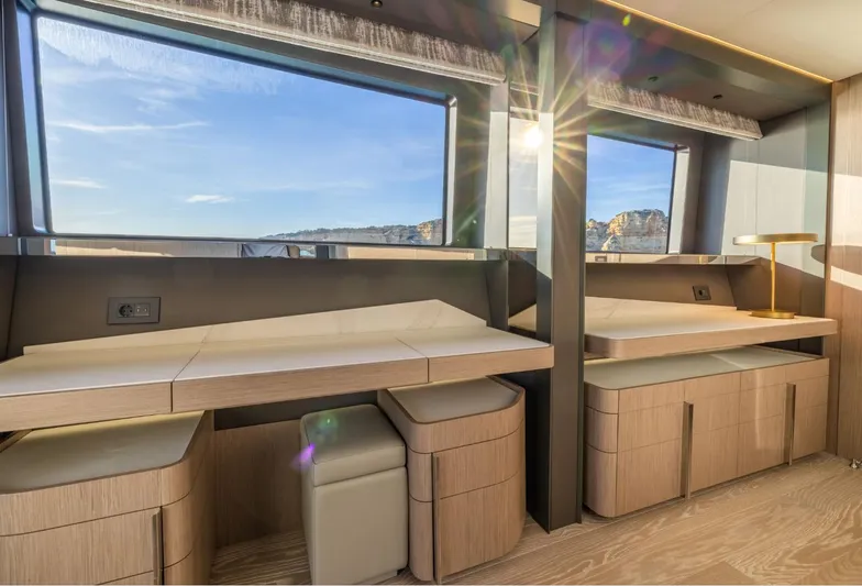  Yacht Photos Pics Luxurious interior of 2025 Sunseeker 100 Yacht with modern furnishings and large windows.