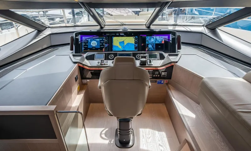  Yacht Photos Pics Modern helm of 2025 Sunseeker 100 Yacht with advanced navigation displays.