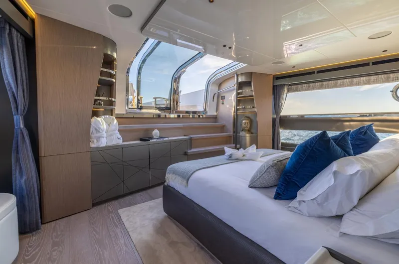  Yacht Photos Pics Luxurious Sunseeker 100 Yacht 2025 bedroom with ocean view and elegant decor.