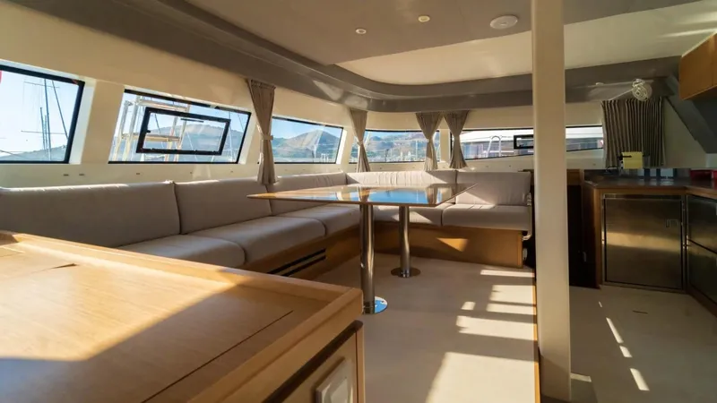  Yacht Photos Pics Luxurious interior of 2023 Excess 15 yacht with spacious seating and modern design.