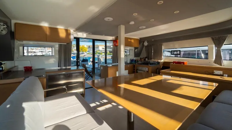  Yacht Photos Pics Luxurious interior of 2023 Excess 15 yacht with modern furnishings and ample natural light.