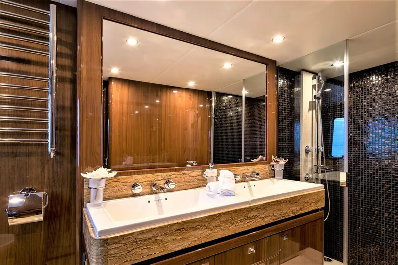  Yacht Photos Pics Luxurious bathroom on 2012 Princess 85 Motor Yacht with dual sinks and modern design.