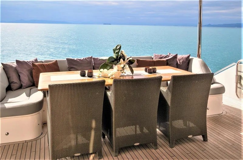  Yacht Photos Pics Luxurious deck seating on 2012 Princess 85 Motor Yacht overlooking serene ocean.