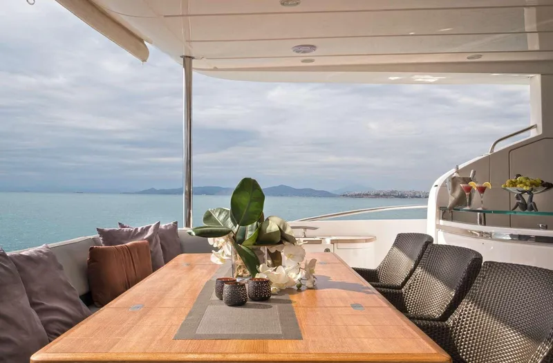  Yacht Photos Pics Luxurious deck of 2012 Princess 85 Motor Yacht with ocean view and elegant seating.