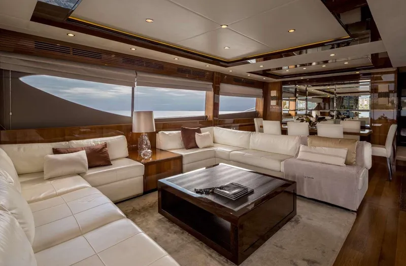  Yacht Photos Pics Luxurious interior of 2012 Princess 85 Motor Yacht with elegant white seating and wooden accents.