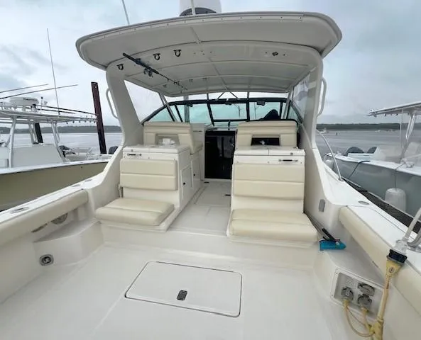 First Light II Yacht Photos Pics 1998 Tiara Yachts 3500 Open with spacious deck and seating, docked at marina.