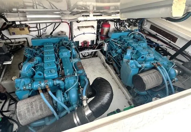 First Light II Yacht Photos Pics Twin engines in a 1998 Tiara Yachts 3500 Open engine room.