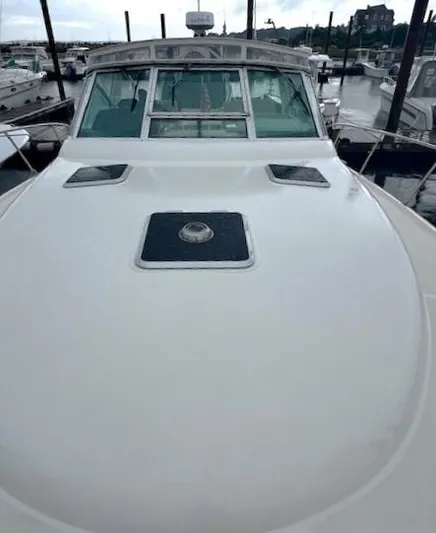 First Light II Yacht Photos Pics 1998 Tiara Yachts 3500 Open docked at marina, front deck view.