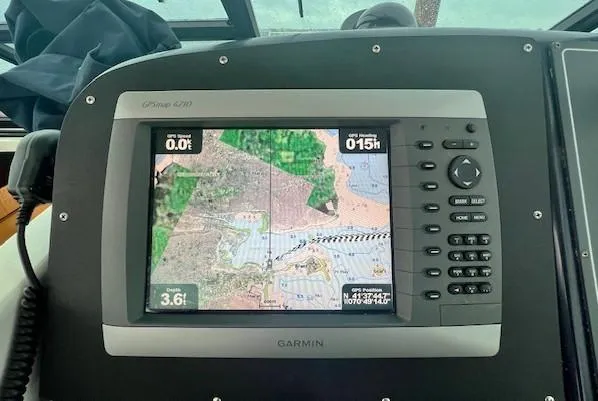 First Light II Yacht Photos Pics Garmin GPS display on 1998 Tiara Yachts 3500 Open boat dashboard.