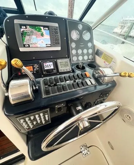 First Light II Yacht Photos Pics 1998 Tiara Yachts 3500 Open helm with navigation controls and steering wheel.