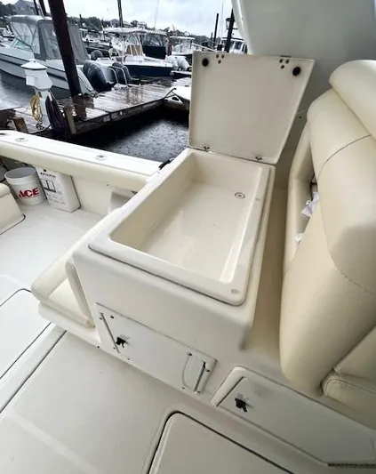 First Light II Yacht Photos Pics 1998 Tiara Yachts 3500 Open boat interior with open storage compartment.