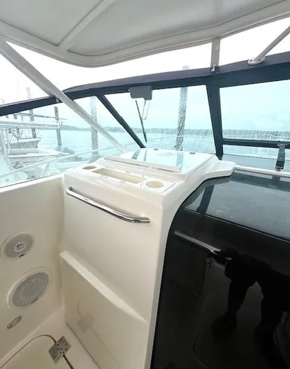 First Light II Yacht Photos Pics 1998 Tiara Yachts 3500 Open helm with modern controls and clear windshield.