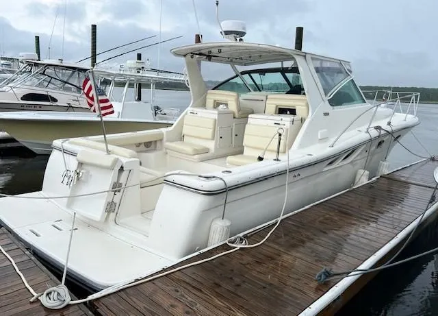 First Light II Yacht Photos Pics 1998 Tiara Yachts 3500 Open docked, featuring sleek design and spacious seating.