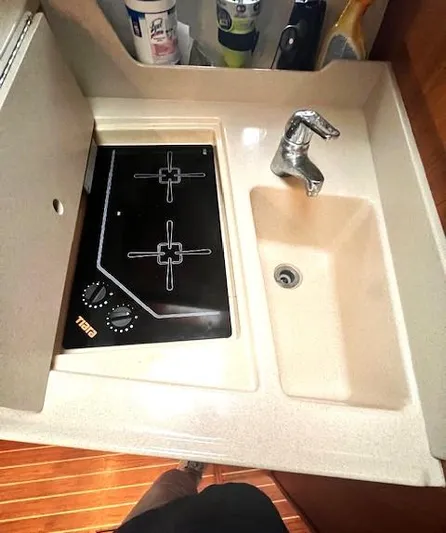 First Light II Yacht Photos Pics 1998 Tiara Yachts 3500 Open kitchen with stove and sink.