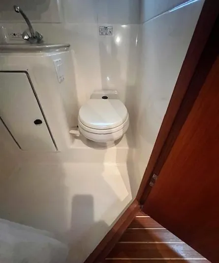 First Light II Yacht Photos Pics 1998 Tiara Yachts 3500 Open bathroom with toilet and sink.