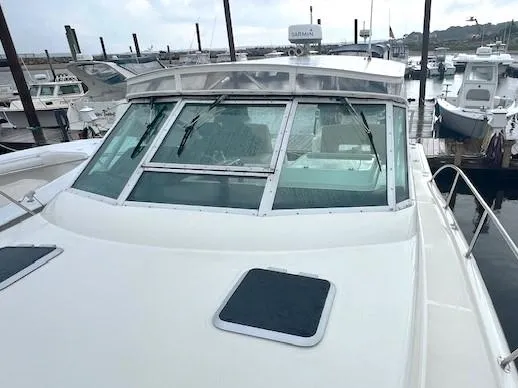 First Light II Yacht Photos Pics 1998 Tiara Yachts 3500 Open docked at marina, front view.